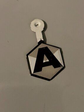 Vintage Hexagon 'A' Pin Monogrammed Tin Litho Badge